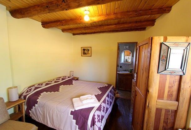 Quechu - Cabañas La Aurora Taique - Cama matrimonial - CheckinFans